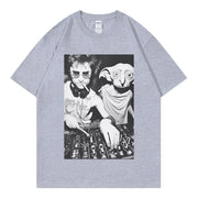 A gothic T-shirt for women featuring Dobby the House Elf DJ with funny expressions designed to be fashionable and loose-fitting